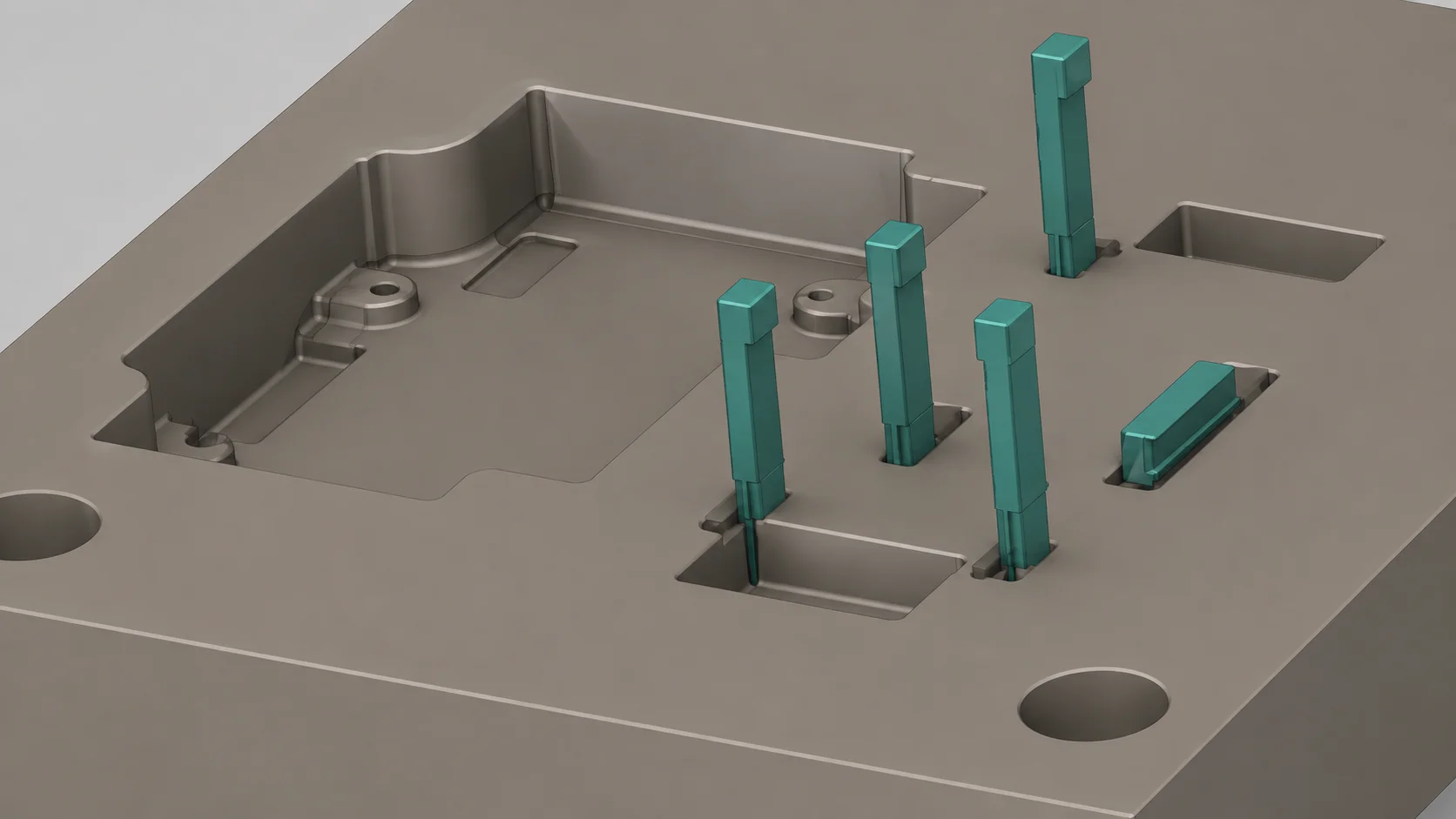 CAD render of core inserts standing in a mold cavity block
